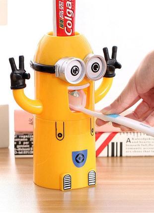 Яскравий автоматичний дитячий дозатор зубної пасти міньйон. найкраща ціна!5 фото