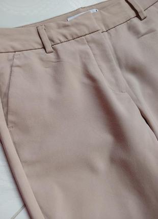 Шикарні бежеві завужені штани/брюки reserved8 фото