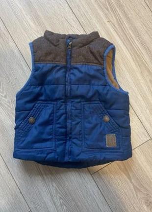 Безрукавка, жилетка