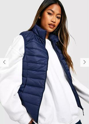 Жилетка коротка темно синього кольору