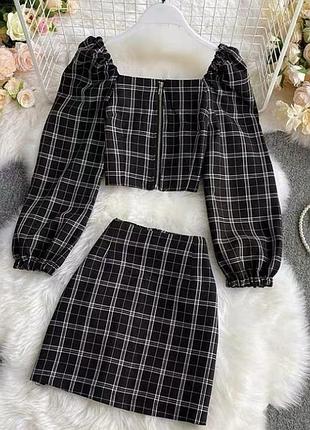 Костюм в клітинку зі спідницею