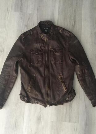 Шкіряна куртка tigha