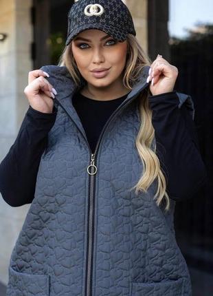 Жіноча осіння подовжена жилетка