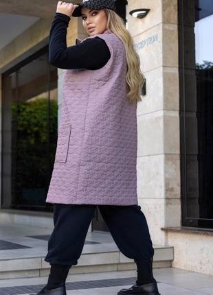 Жіноча осіння подовжена жилетка