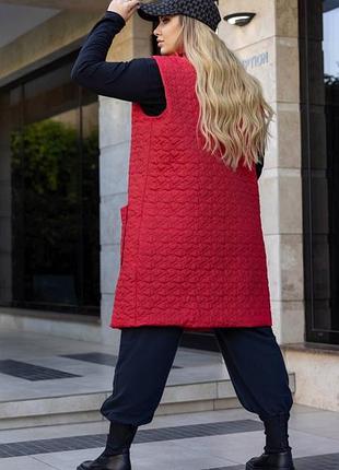 Жіноча осіння подовжена жилетка