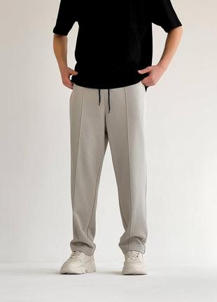 Мужские качественные удобные свет бежевые спортивные широкие брюки10 фото