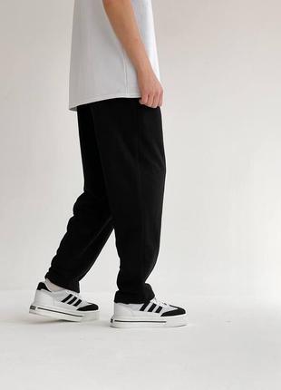 Чоловічі якісні зручні чорні спортивні широкі штани4 фото