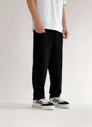 Чоловічі якісні зручні чорні спортивні широкі штани5 фото