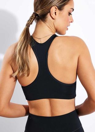 Женский спортивнй топ nike pro med pad bra8 фото