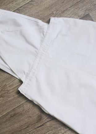 Американский белый сарафан джинсовый комбинезон с накладными карманами от cooperative6 фото