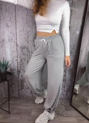 Женские объемные спортивные штаны с затяжками3 фото