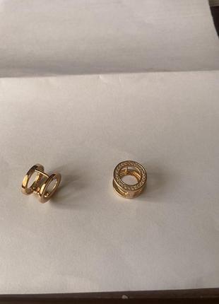 Модні трендові двосторонні сережки