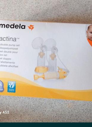 Молокоотсос medela