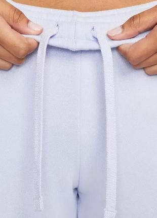 Спортивні штани nike кльоші утеплені на флісі3 фото