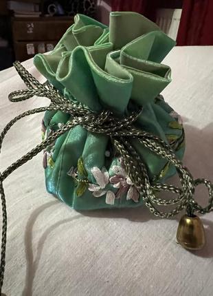 Мішочок для зберігання прикрас декорований квітами