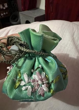 Мішочок для зберігання прикрас декорований квітами