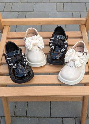 Туфли туфельки для дівчат чорні і білі з бантом3 фото