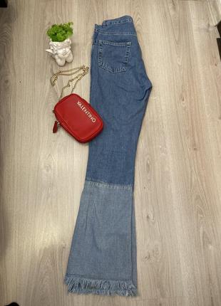 Голубые джинсы клеш с необработанным краем2 фото