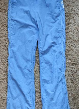 Брюки штаны женские спортивные голубые с белой полоской с карманами
с утяжками на поясе