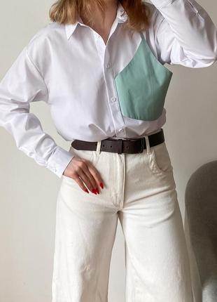 Белая рубашка оверсайз с декоративным элементом