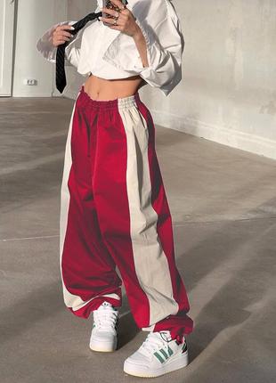 Трендовые женские легкие широкие комбинированные брюки10 фото