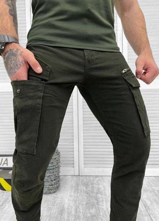 Джогери зеленого кольору джогери колір хакі матеріал бавовна еластан чоловічі штани джогера олива хакі4 фото