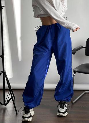 Хітові жіночі широкі штани парашути (карго) з плащівки, на затяжках9 фото