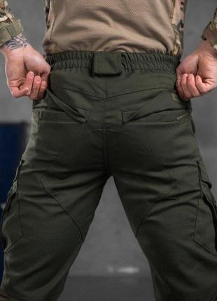 Штани оливкові штани колір хакі матеріал рипстоп чоловічі штани з еластичними вставками хлястики хакі3 фото