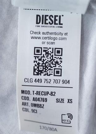 Женская футболка diesel светло-серого цвета.8 фото