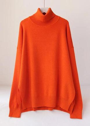 Класний якісний яскравий светр з розрізами по бокам