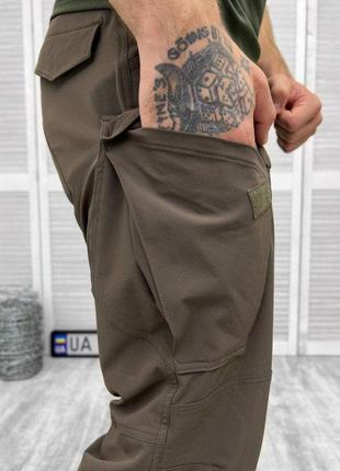 Легкие штаны коричневого цвета летние штаны стрейчевые брюки джоггеры темные воєнторг ua5 фото