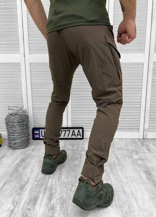 Легкие штаны коричневого цвета летние штаны стрейчевые брюки джоггеры темные воєнторг ua3 фото