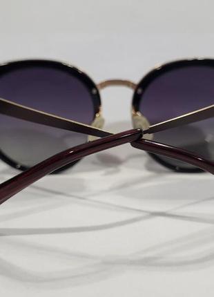 Жіночі сонцезахисні окуляри коричневі "котяче око"2 фото