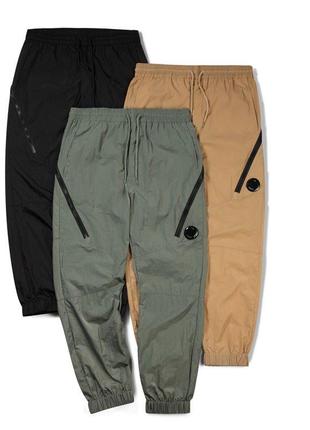 Штани cp company