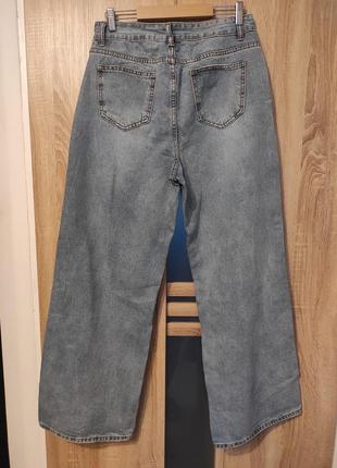Трендовые джинсы палаццо
