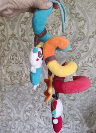 Игрушка на колясок детский