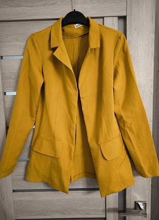 Жіночий жaкет