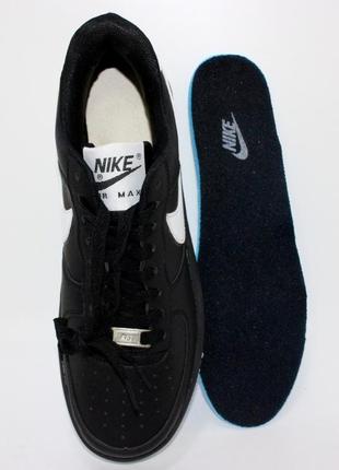 Чоловічі чорно-білі кросівки на плоскій підошві. чорний10 фото