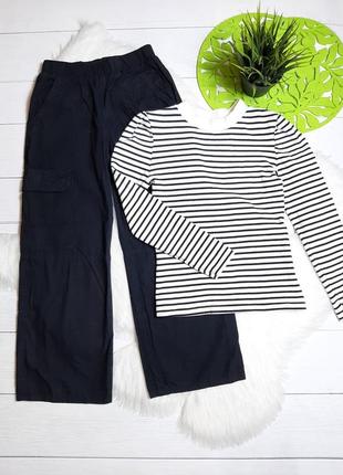 Гольф в рубчик и широкие брюки с карманами