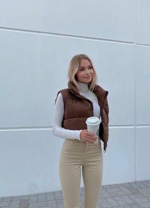Женская жилетка