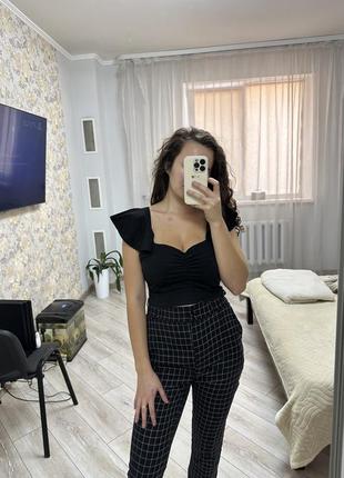 Женские брюки в клетку