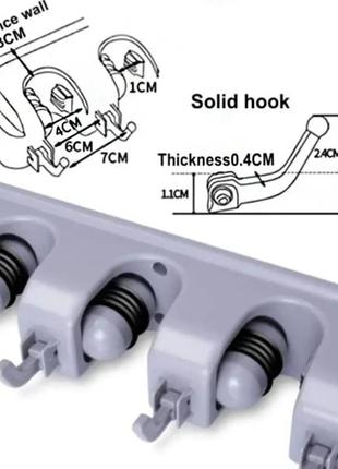 Держатель для швабры с крючками broom holder5 фото