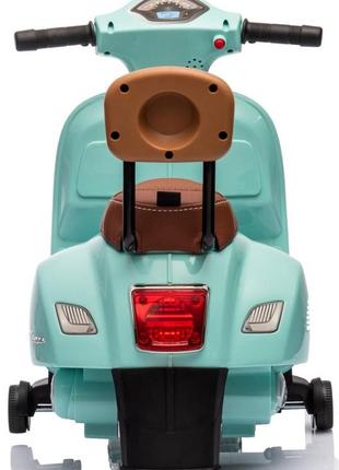 Скутер дитячий електричний із спинкою та сидінням з екошкіри scooter vespa бірюзовий3 фото