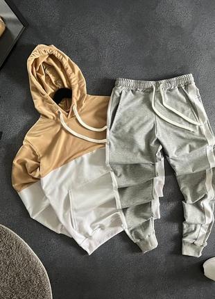 Топові, осінні костюми.