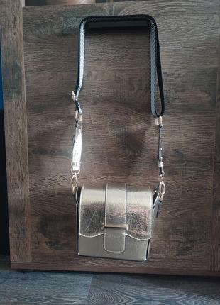 Золотиста сумка кросбоді