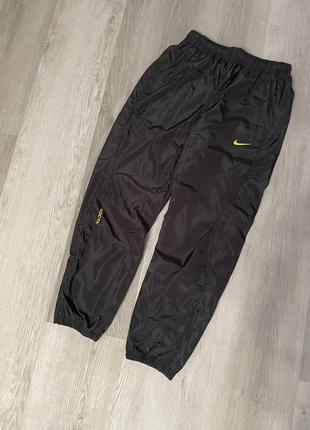 Нейлоновые брюки nike nocta