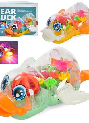 Игрушка утка музыкальная со светом прозрачный корпус и цветные детали fw-2065a