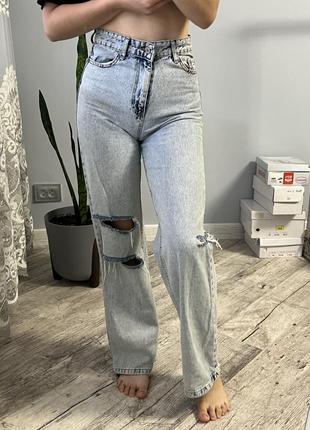 Джинсы рваные клеш