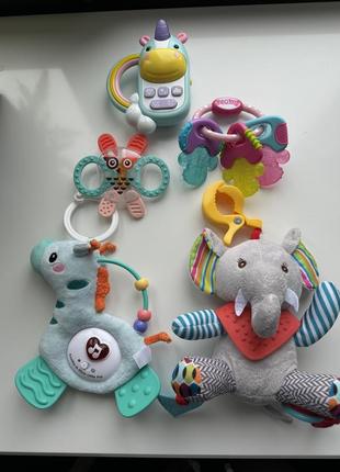 Іграшки для малюків. skip hop, taf toys, nuby