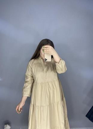 Бежевое платье трапеция подойдет для беременных5 фото